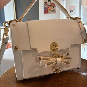 White leather handbag